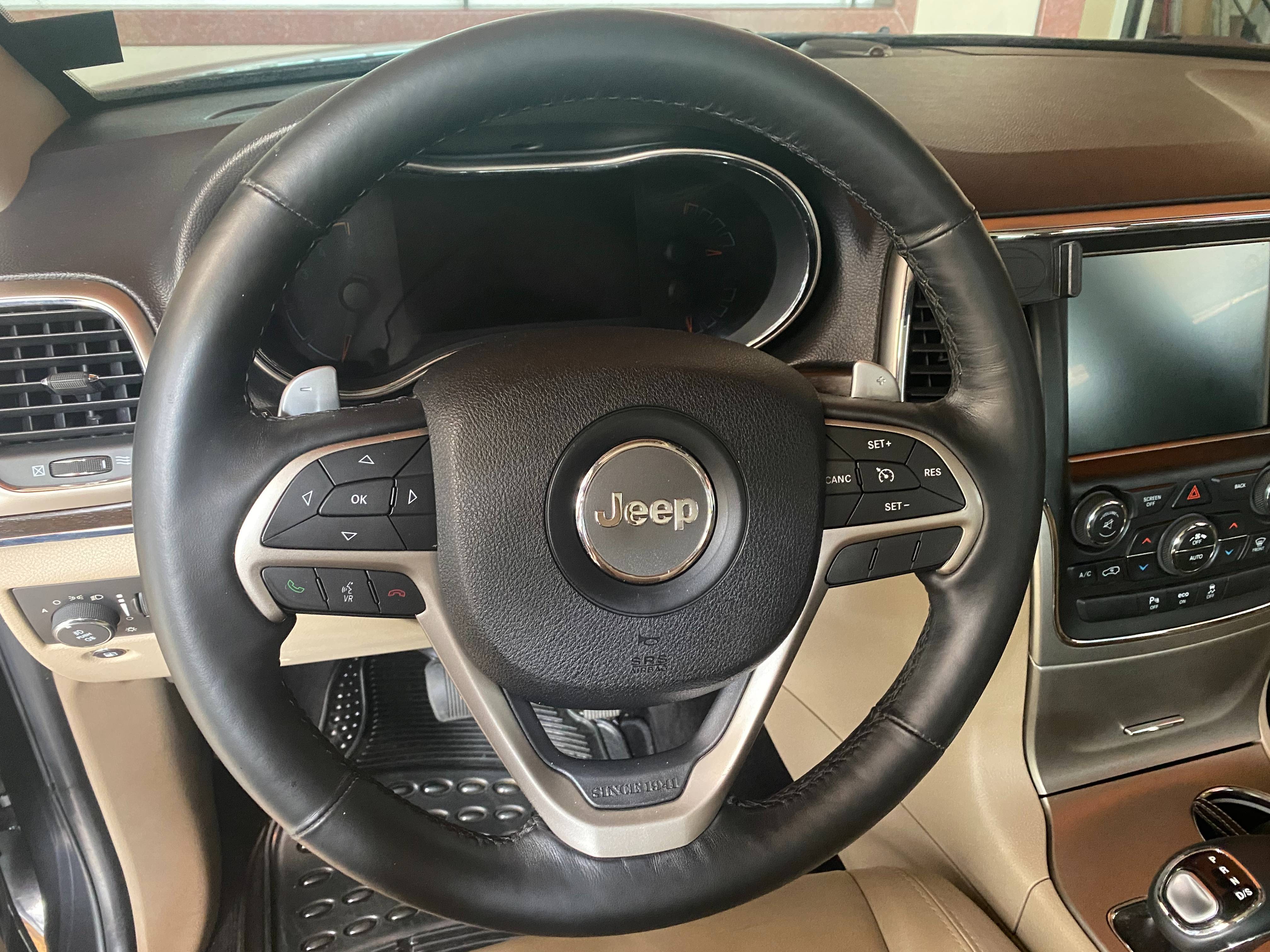 Old 2014 Jeep Grand Cherokee Limited