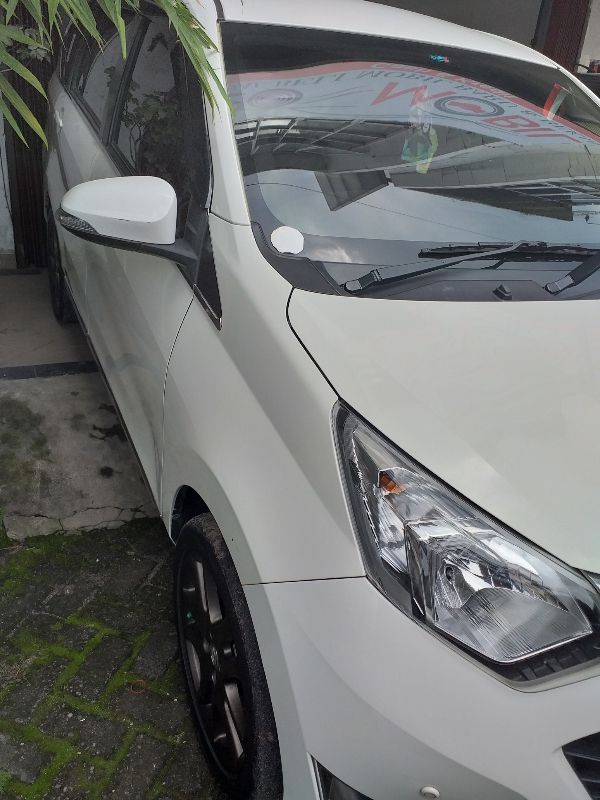2018 Daihatsu Sigra  1.2 R MT 1.2 R MT tua