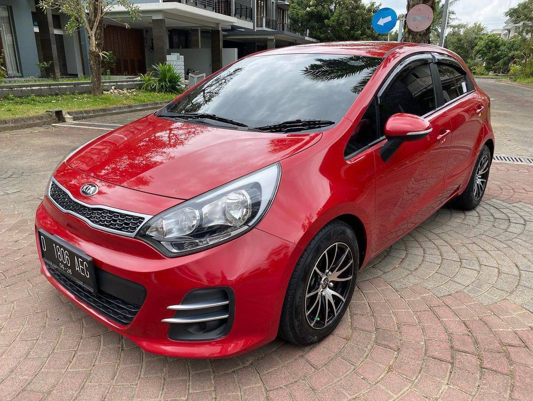 2015 Kia Rio  1.4L AT 1.4L AT tua