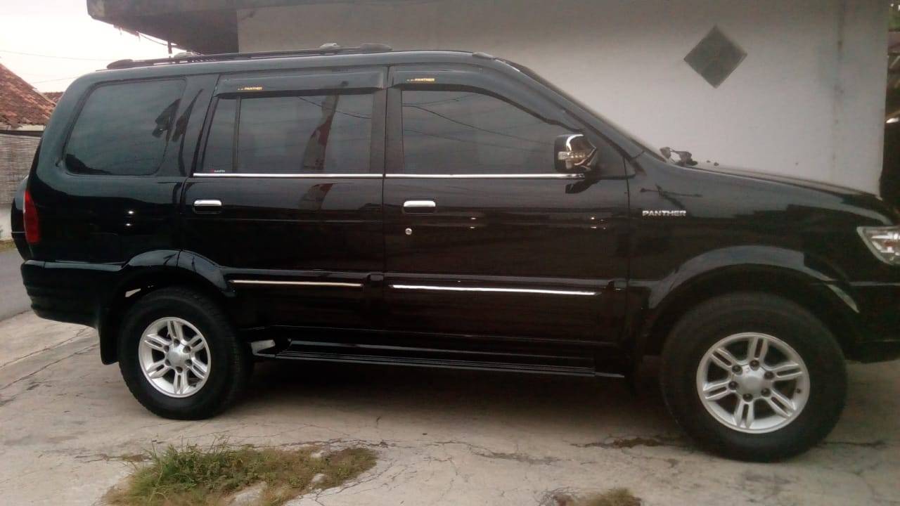 Old 2004 Isuzu Panther Grand Touring 2.5L MT Grand Touring 2.5L MT