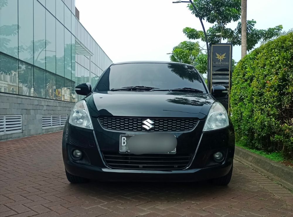 2014 Suzuki Swift Bekas