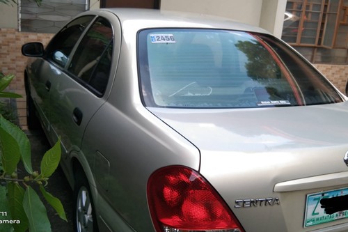 Old 2009 Nissan Sentra 1.3L GX MT