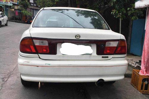 Old 1997 Mazda 323 Familia MT