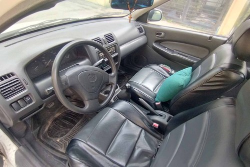 Second hand 1999 Mazda 323 Familia MT 