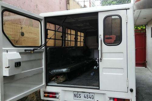 Old 2021 Isuzu Traviz L Utility Van